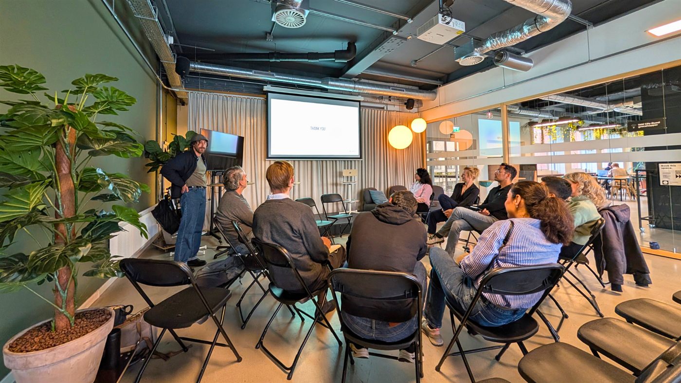 Flux Forward in-room session with a facilitator and small audience